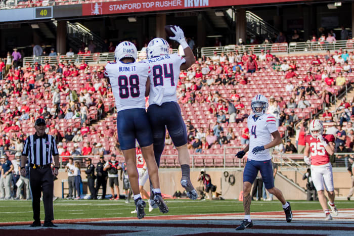 Sep 23, 2023; Stanford, California, USA; Arizona Wildcats tight end Tanner McLachlan (84) is congratulated by tight end Keyan Burnett (88) after scoring a touchdown against the Stanford Cardinal during the second quarter at Stanford Stadium. Mandatory Credit: John Hefti-USA TODAY Sports